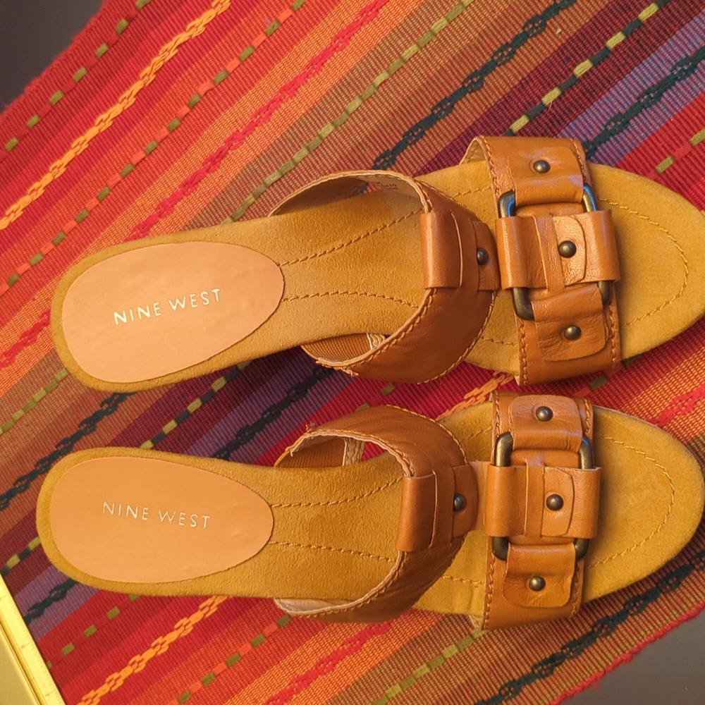 Dark tan wedges. Size 7 1/2 M. None West
